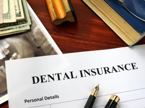 Dental insurance form on desk
